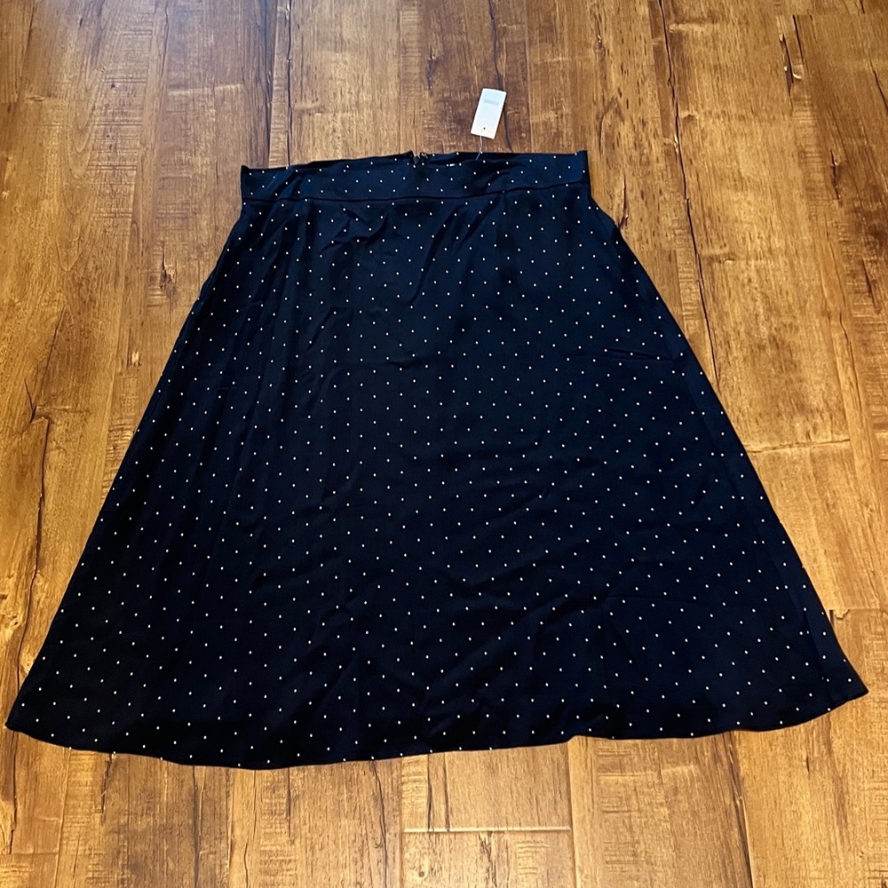 LOFT navy blue polka dot skirt size 12.  New with tag.  Aline midi length.